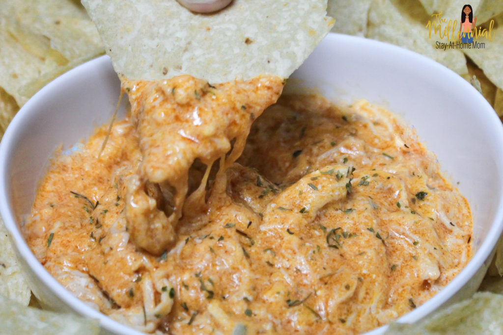 Grab your Instant Pot and Indulge in this super simple, delicious, creamy buffalo chicken dip! With only 6 ingredients, it's sure to be a hit for game day!
