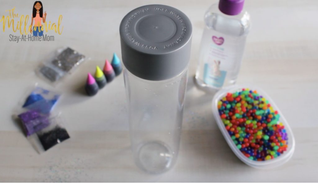 These DIY Toddler Sensory Bottles are a fun, easy craft for toddlers that encourages learning and curiosity. Learn how you can make your very own!