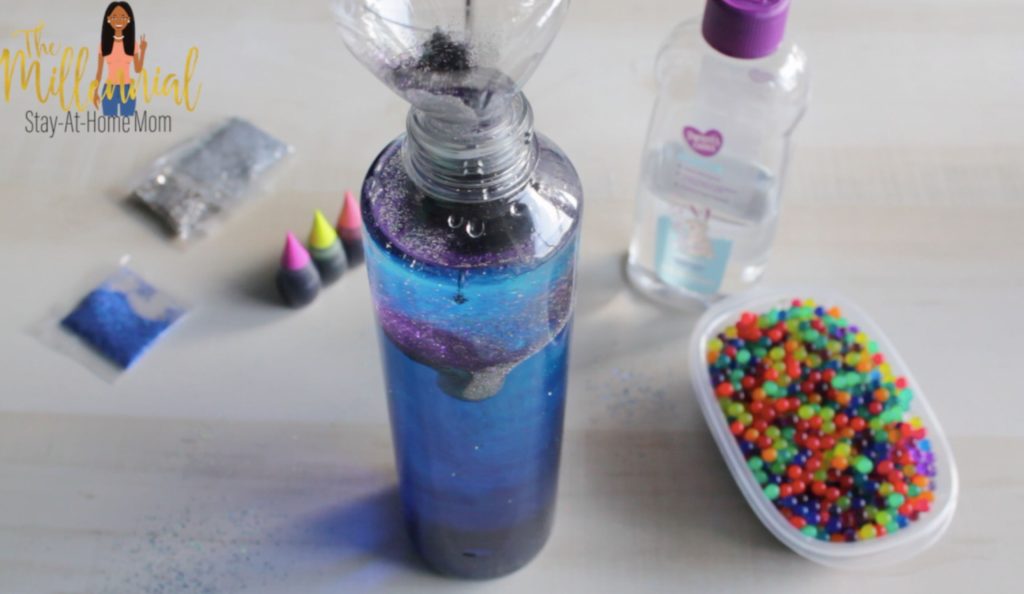 These DIY Toddler Sensory Bottles are a fun, easy craft for toddlers that encourages learning and curiosity. Learn how you can make your very own!