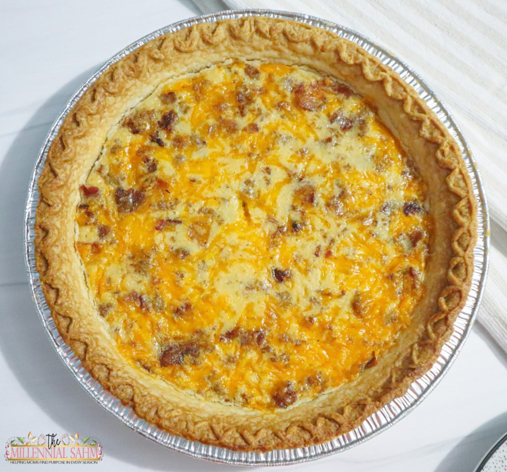 This delicious Breakfast Quiche with sausage and bacon is super easy to make and is sure to be a hit with the entire family.