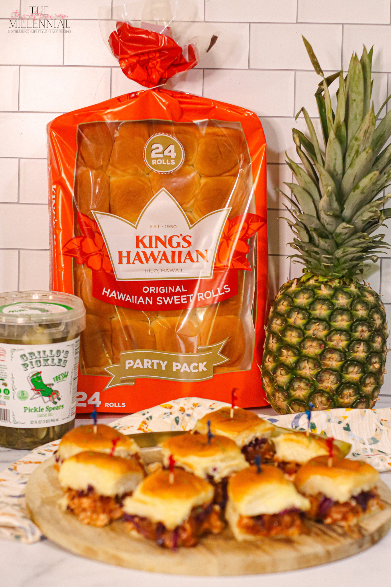 These BBQ Chicken sliders are topped with a delicious Pineapple Bacon Jam and are perfect for your next summer gathering!