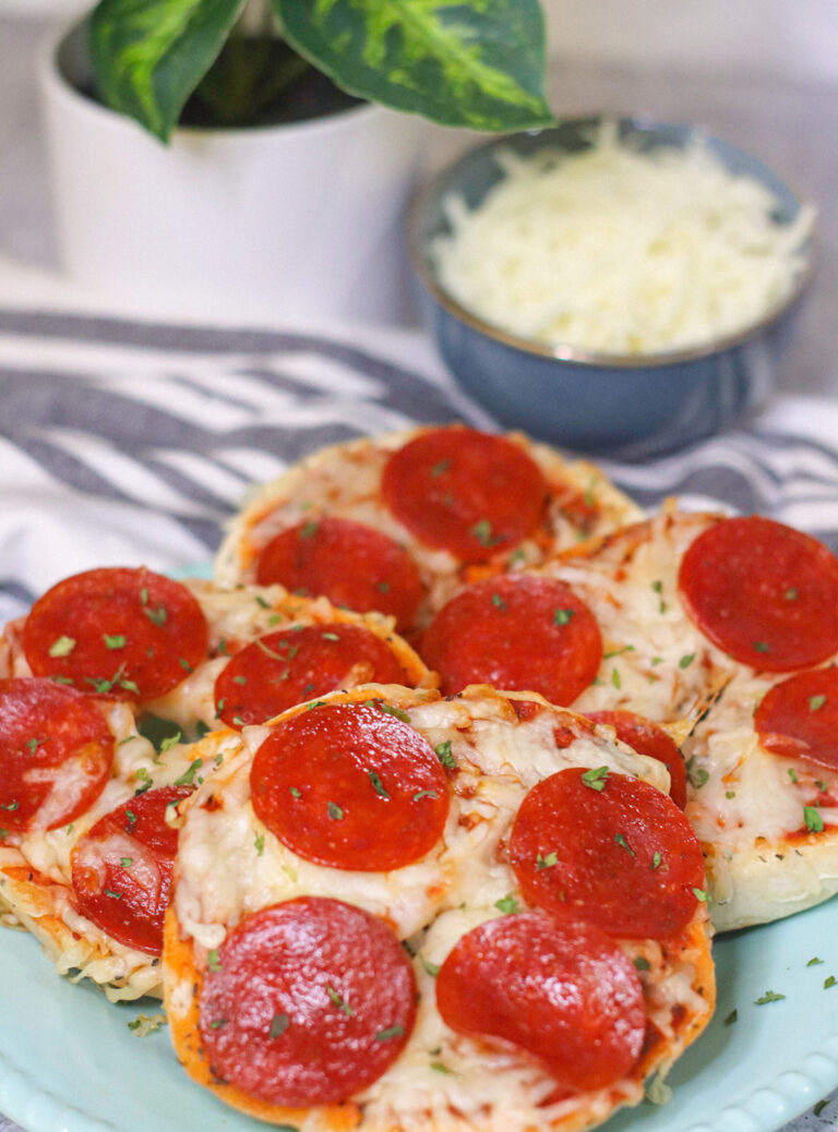 These Pizza Roll Ups take the guesswork out of snack time and can be made in less than 10 minutes in the air fryer!