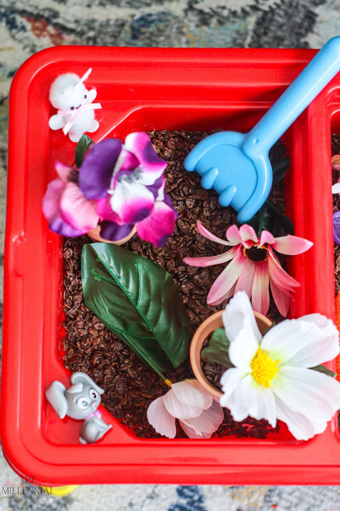 Sensory play has become a daily part of our morning routine and this garden-themed sensory table is perfect for your little learner!