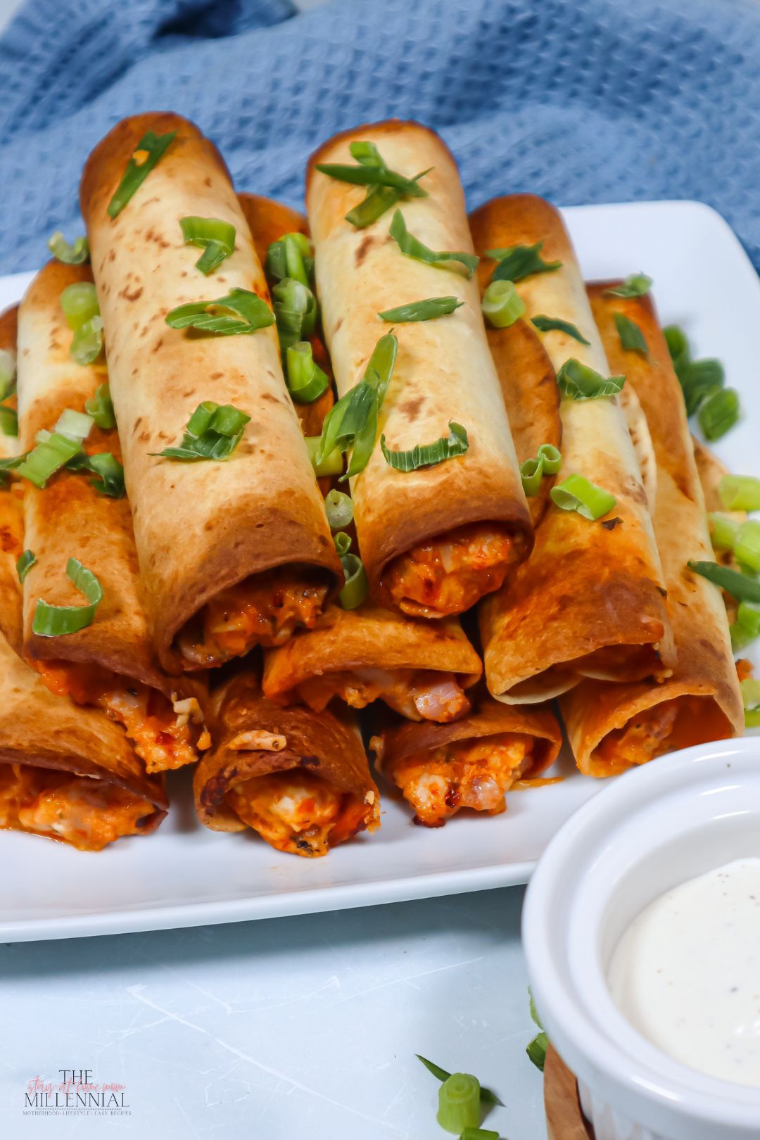 These air fryer buffalo chicken taquitos are full of flavor and can be whipped up in minutes - the perfect appetizer to have in your arsenal.