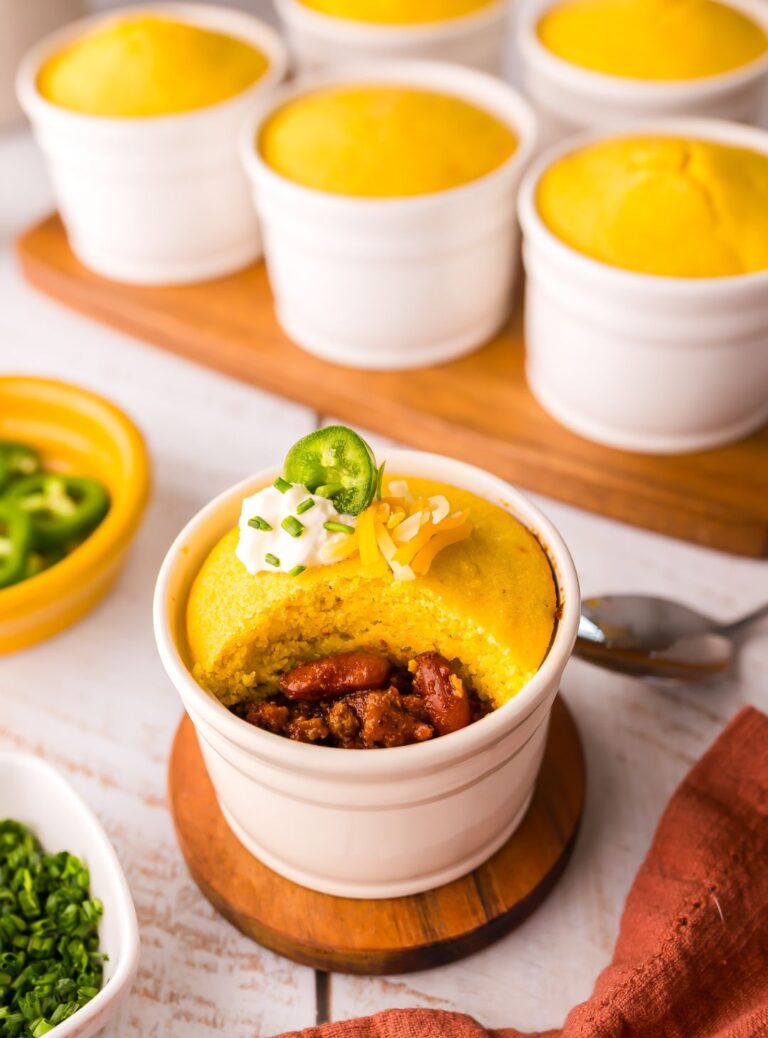 Cornbread casserole with a twist! These mini chili cornbread casseroles are a delicious, cozy comfort meal that the entire family will enjoy!